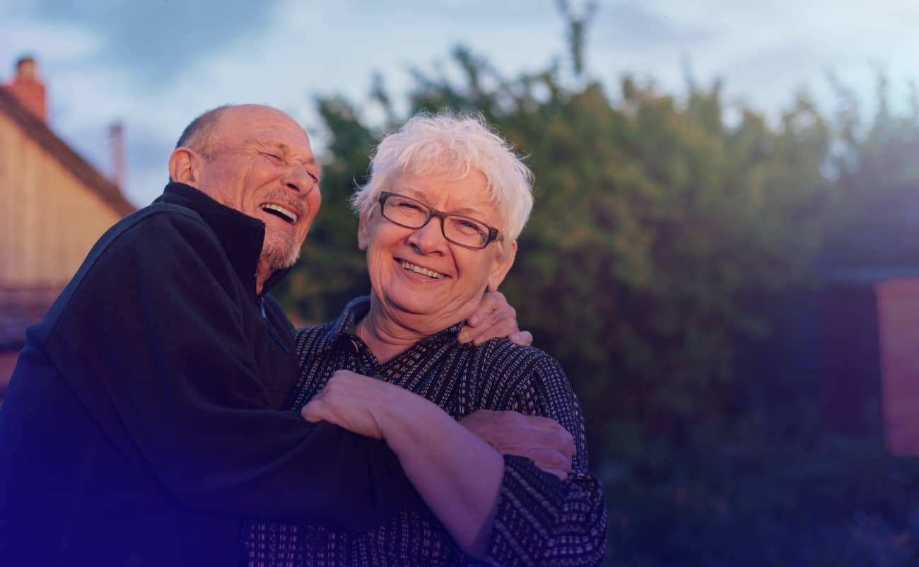 Elderly Couple Hugging 